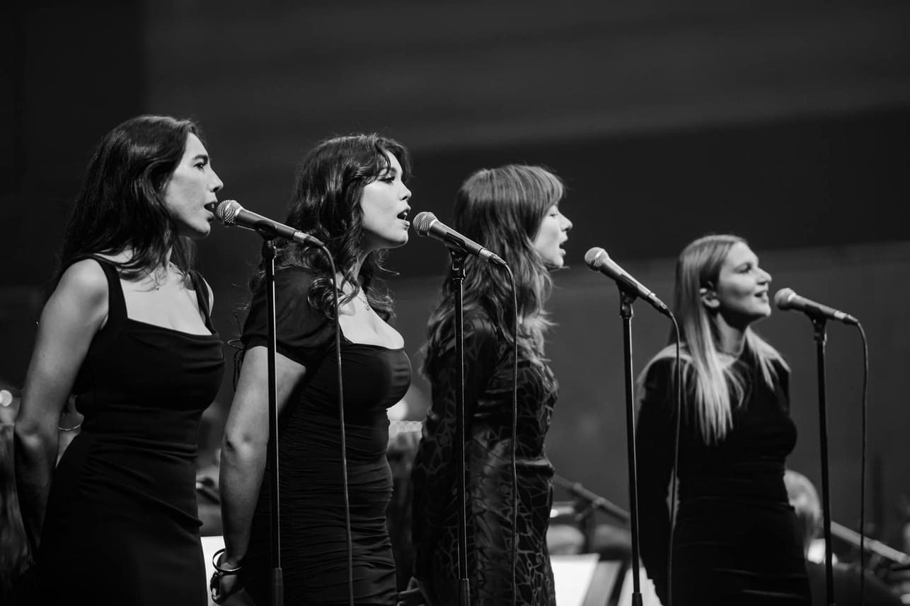 Jess Fairlie on vocals alongside three other singers